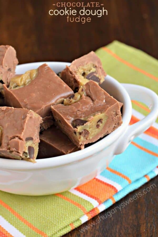 This Chocolate Cookie Dough Fudge is easy to make thanks to a roll of refrigerated cookie dough. One bite of perfection coming right up!