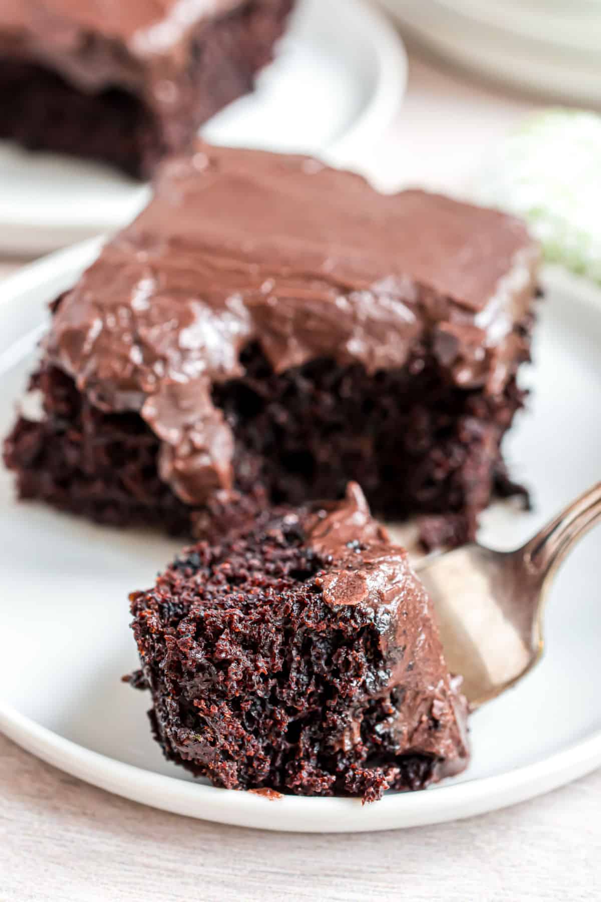 Fudgy brownie bite with frosting.