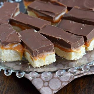 Glass plate with homemade twix bars.