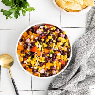 Forget buying jars of salsa when you can make this delicious Corn and Black Bean Salsa at home! With jalapeno peppers and a hint of lime, this homemade salsa is perfect for scooping with chips or adding to your tacos.