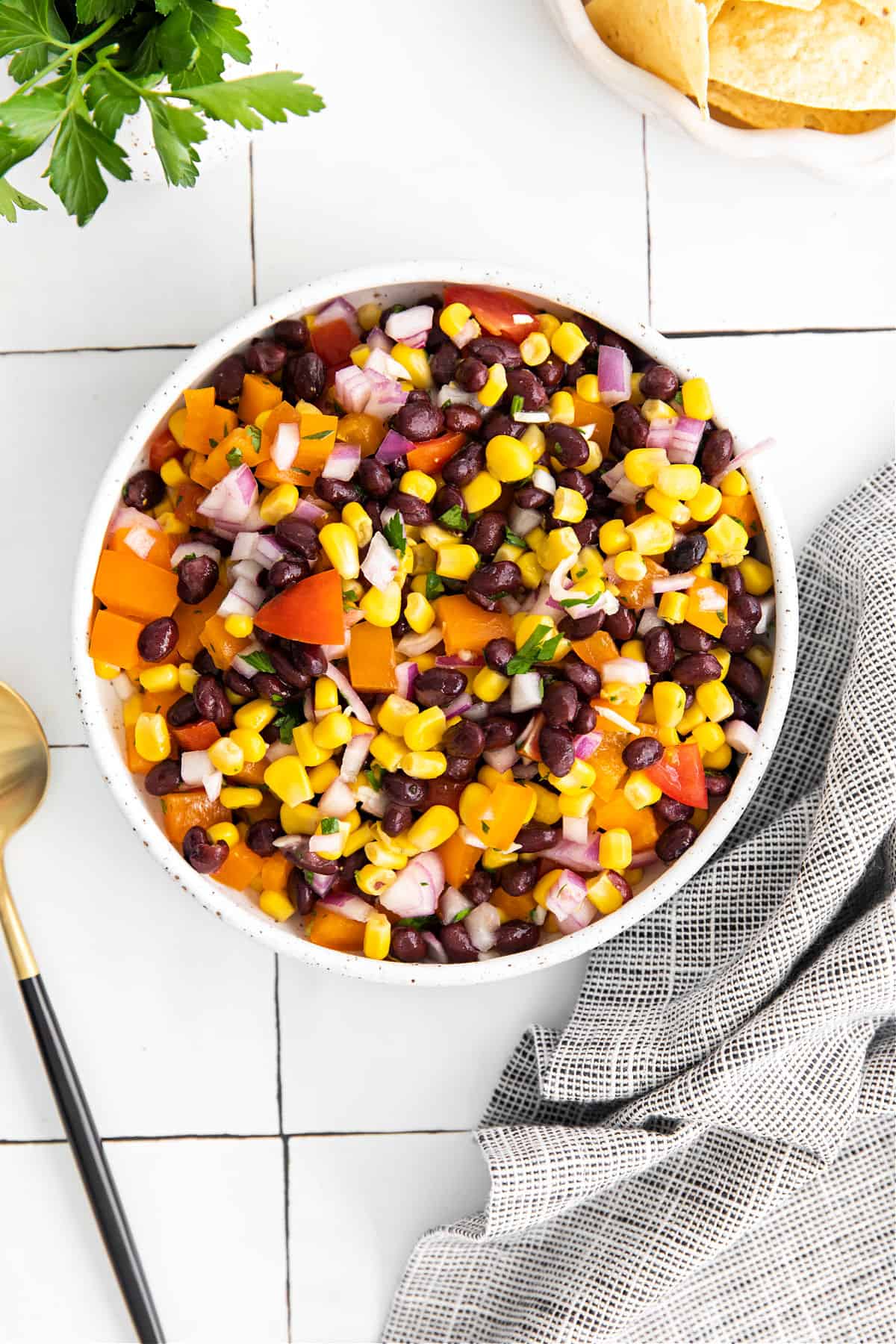 Corn and black bean salsa served in a white bowl.