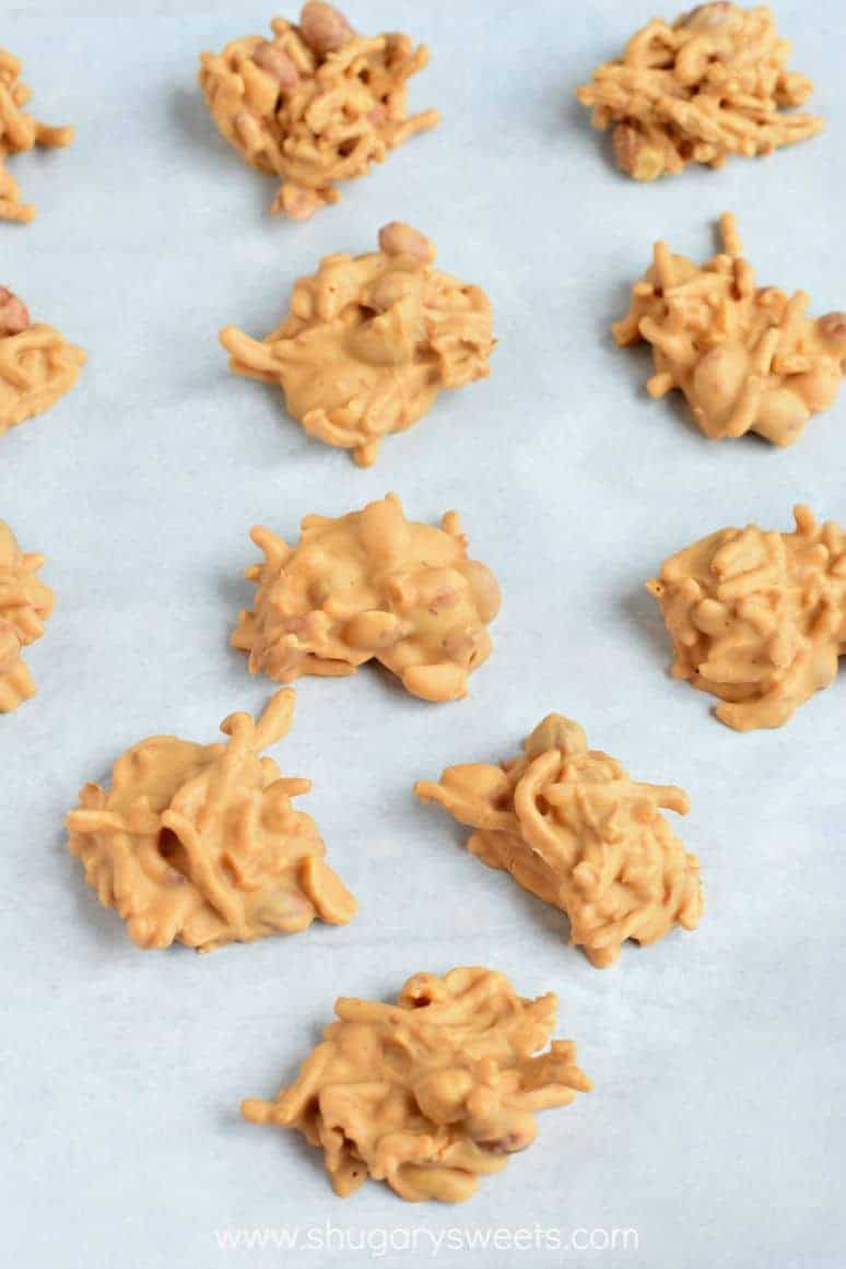Parchment paper with several scoops of no bake haystacks.