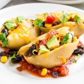 If you love easy, delicious dinner ideas, these Stuffed Taco Shells are for you! Prep these Mexican flavored pasta shells in advance and freeze for a later meal.