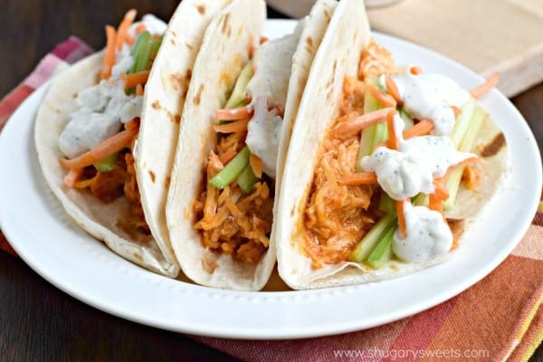 These delicious Buffalo Chicken Tacos are a cinch to put together! Cook up some shredded chicken in your slow cooker tonight, then whip up some of my homemade blue cheese dressing! A fun twist on a game day classic!