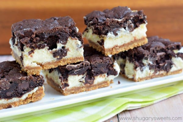 Chocolate Cheesecake Bars: graham cracker crust, creamy vanilla cheesecake and chocolate cookie crunch on top make these the perfect dessert!