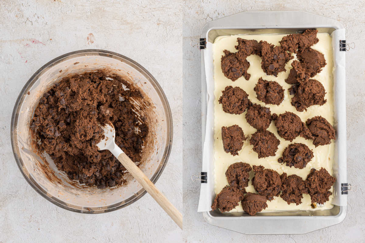 A bowl of chocolate cookie dough and a baking pan with dollops of dough on a creamy layer, ready to be baked into delicious chocolate cheesecake bars.