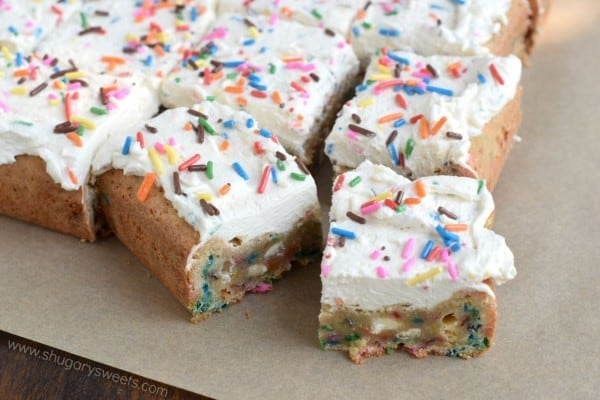 Frosted Funfetti Blondies!! Chewy blondies loaded with colorful sprinkles and topped with a creamy vanilla frosting (with more sprinkles of course)! A fun treat that can be made festive with any color sprinkle.