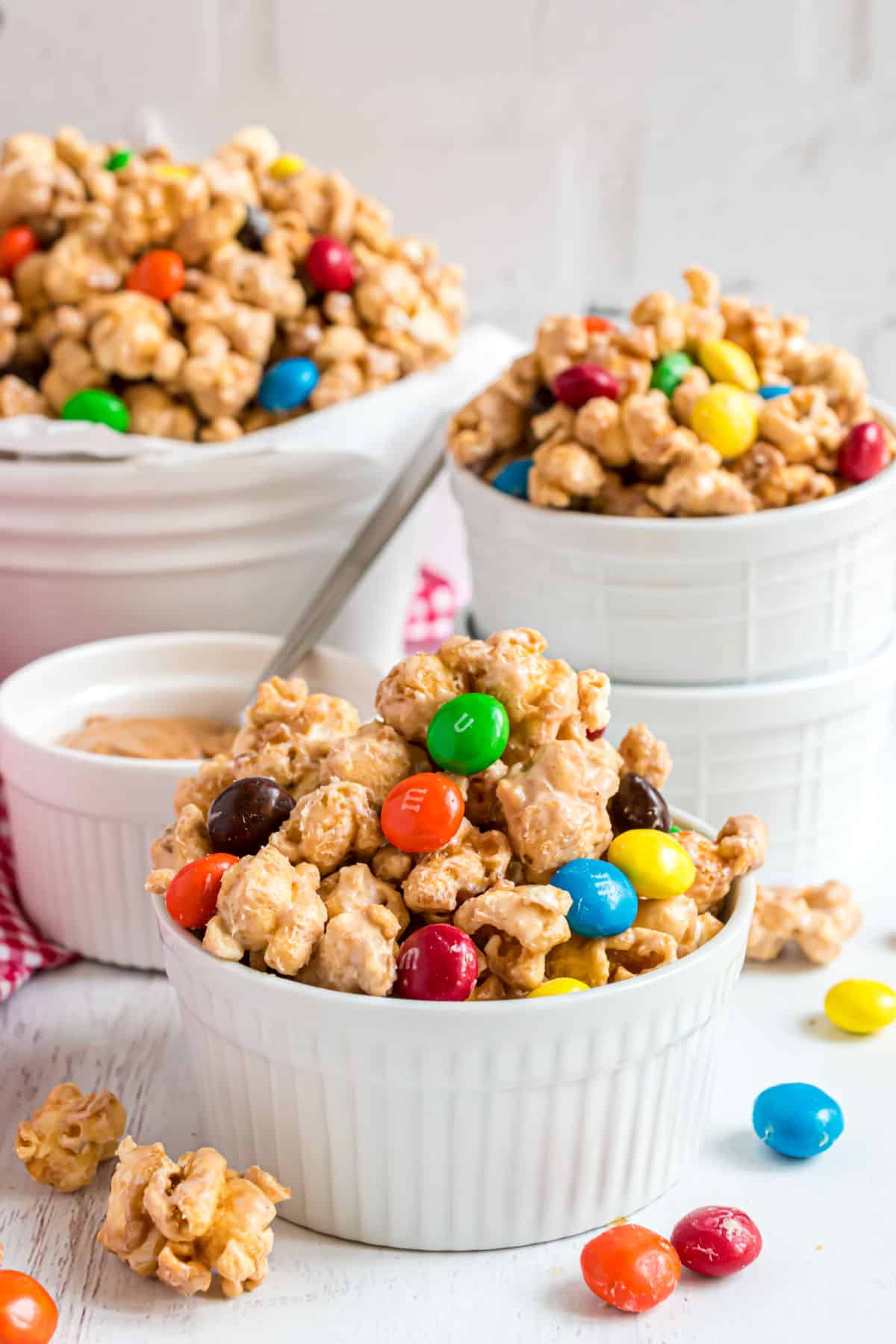 Peanut butter popcorn in a white serving bowls.