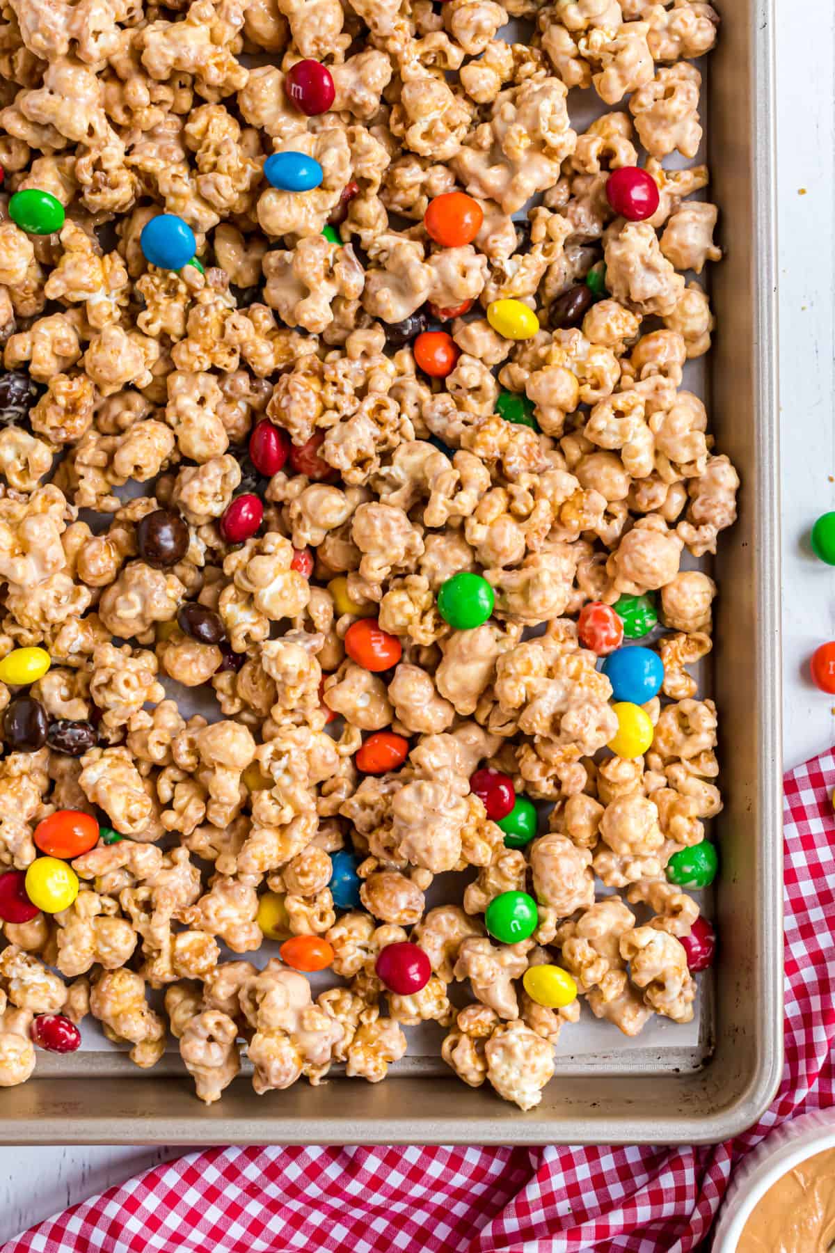 Peanut butter caramel corn on a baking sheet.