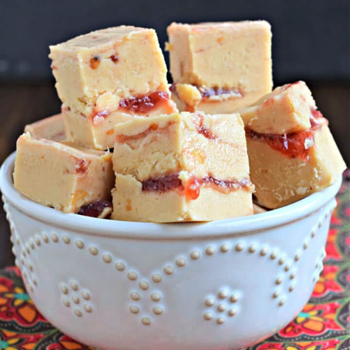 Peanut butter and jelly fudge in a white bowl to serve.