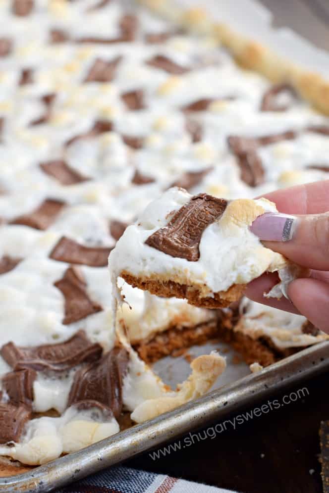 Cracker toffee being lifted out of pan.