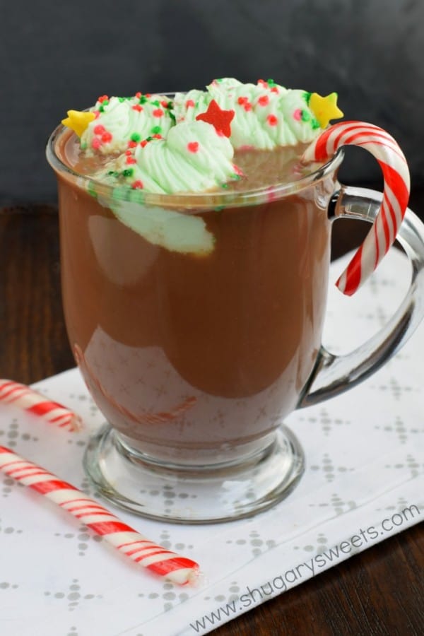 Frozen Peppermint Whipped Cream (Christmas Trees) to add fun and flavor to your hot chocolate or coffee this holiday season! Easy to make this recipe ahead of time and freeze until ready to enjoy.