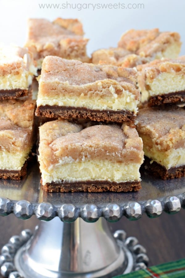 Layered Eggnog Cheesecake bars with a gingersnap crust, creamy cheesecake filling and snickerdoodle cookie topping! This is the ultimate dessert recipe, and it's easy enough to make!