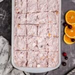 Get a head start on your holiday cooking with this Frozen Cranberry Orange Salad! This recipe can be made days in advance for a cold, sweet side dish full of festive flavor.