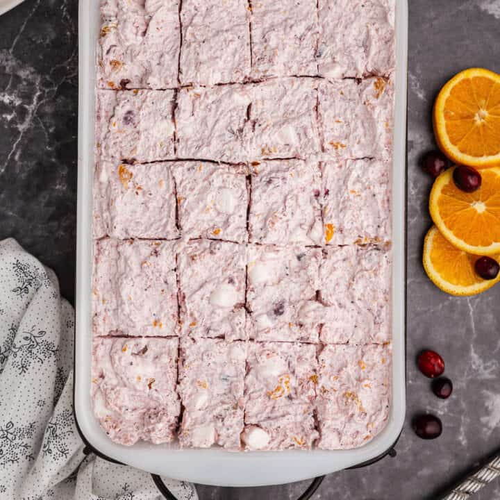 Get a head start on your holiday cooking with this Frozen Cranberry Orange Salad! This recipe can be made days in advance for a cold, sweet side dish full of festive flavor.