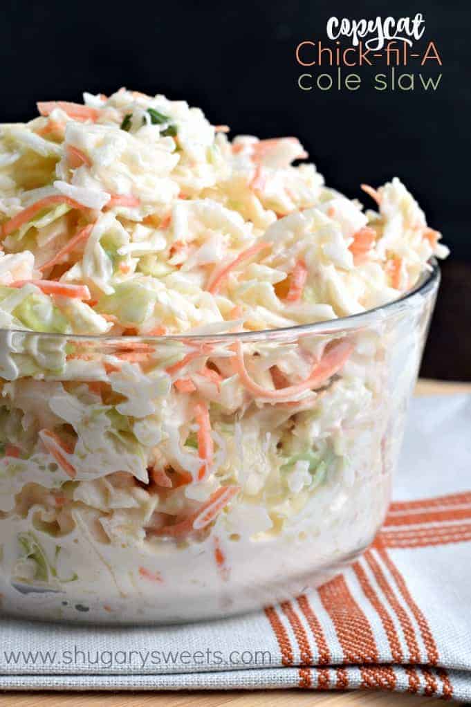 Cole slaw in a clear glass bowl for serving.