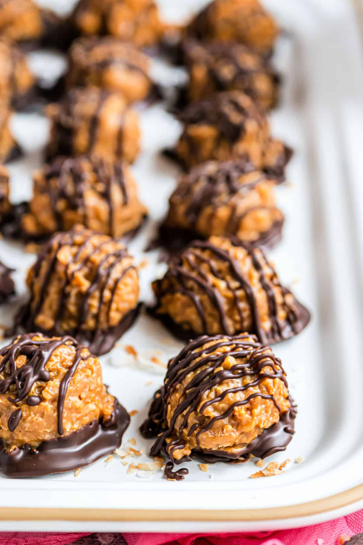 Truffles on a parchment paper lined cookie sheet.