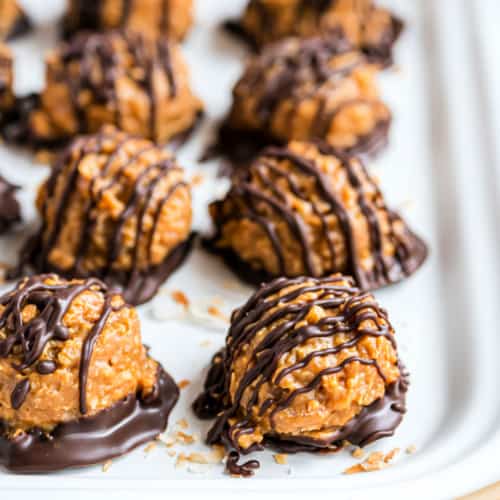 If you love Caramel deLites or Samoa Girl Scout Cookies, then these easy Samoa Truffles are going to drive your taste buds crazy! Chewy delicious candy made from scratch, no girl scout cookies needed.