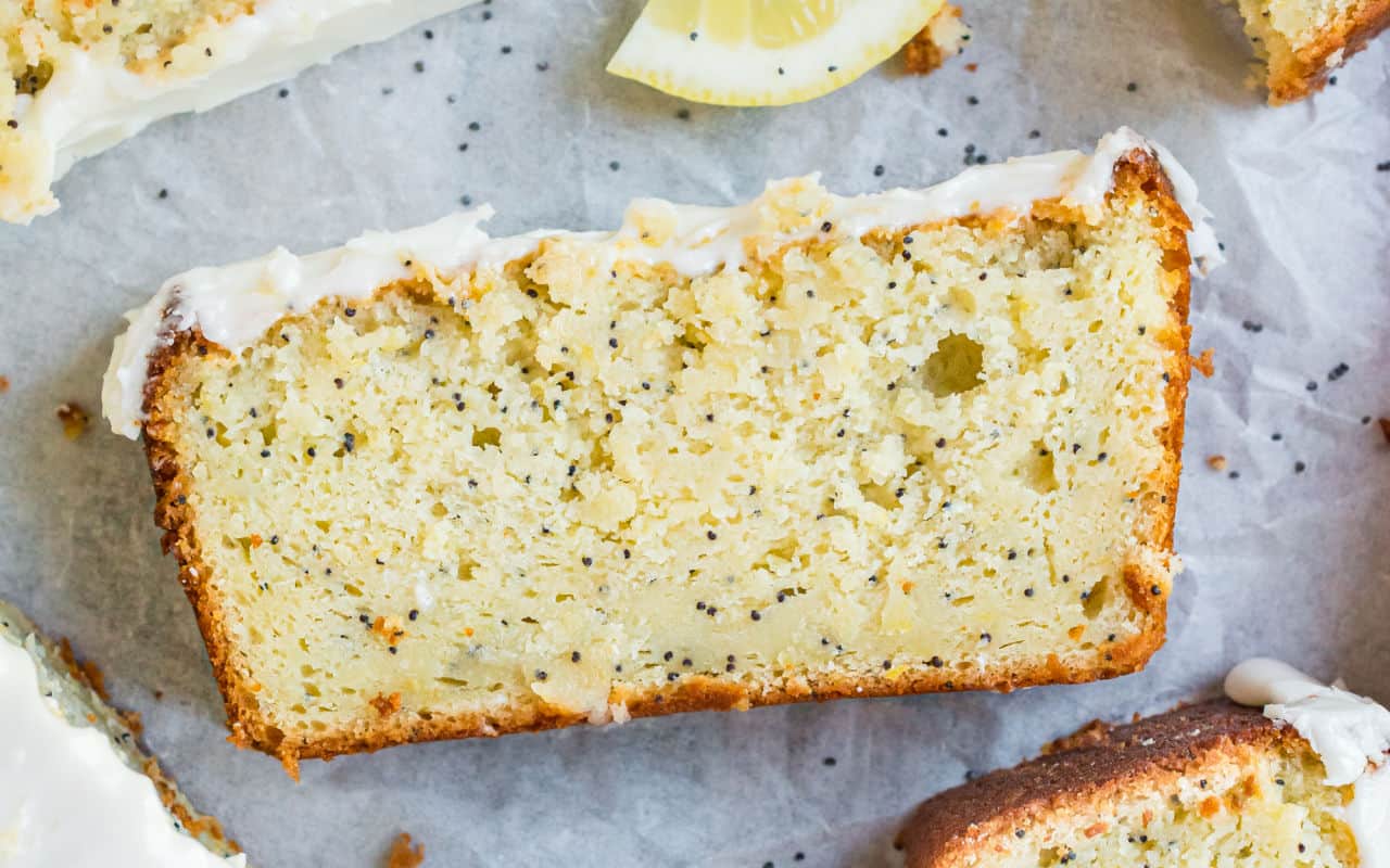 Lemon Poppy Seed Bread is a delicious easy quick bread recipe with a lemon cream cheese frosting! Every slice of this moist loaf delivers   tangy lemon flavor and the perfect amount of sweetness. 