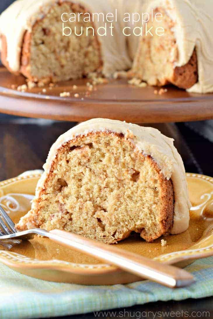Apple bundt cake with caramel icing on a yellow plate with fork.