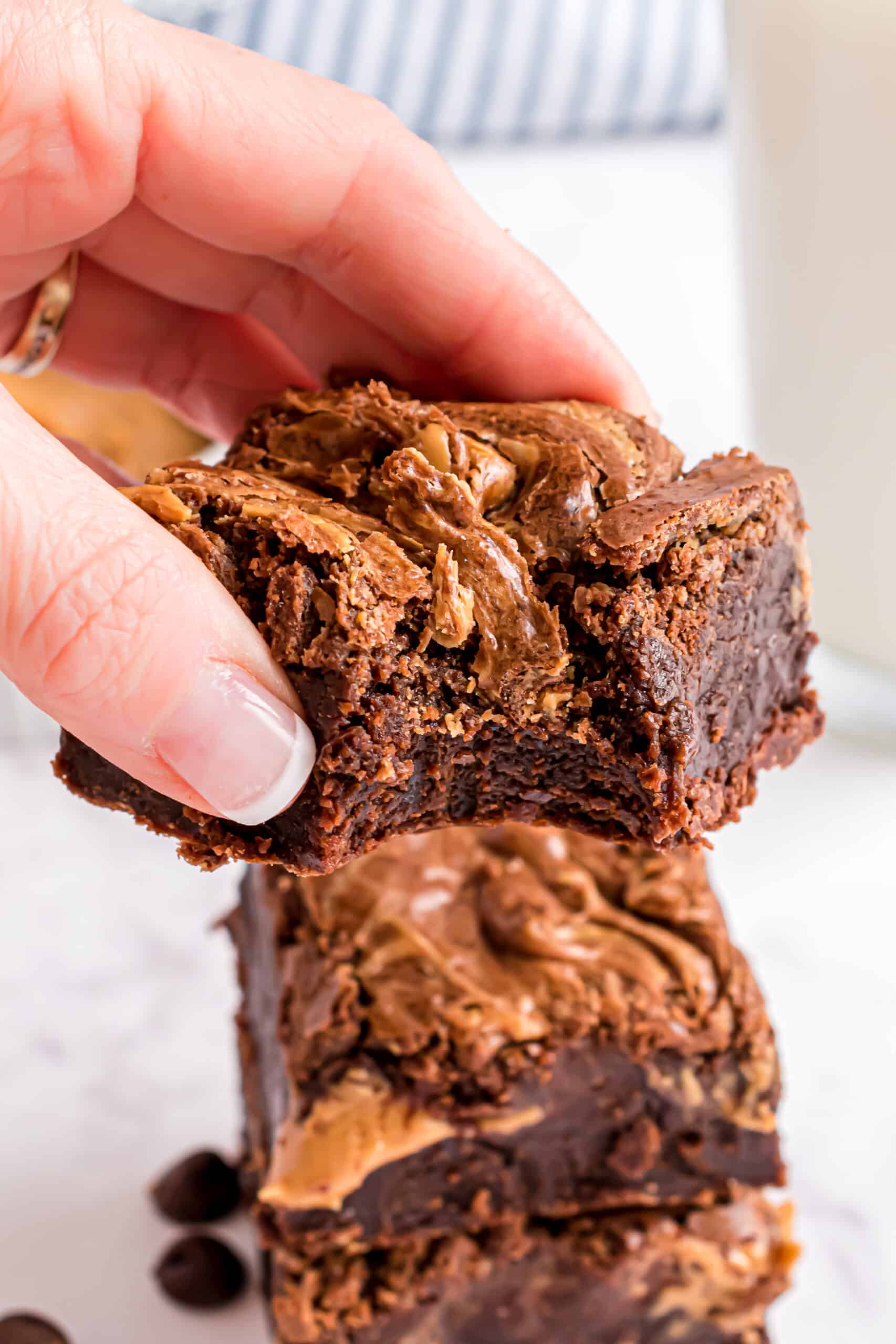 Peanut butter brownies with a bite removed.