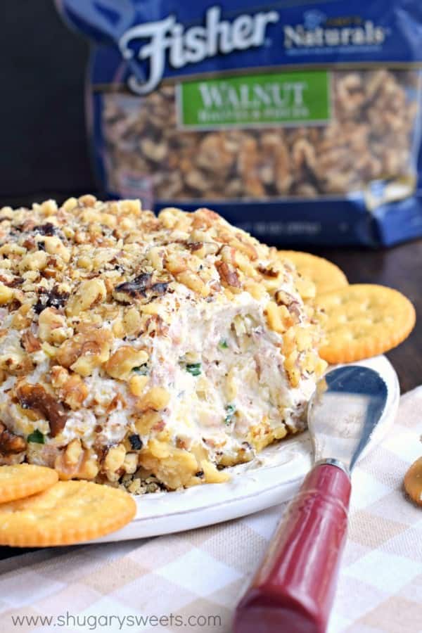 If you're looking for the most delicious game day snack, this Pineapple Ham Cheese Ball recipe is your answer. The sweet, salty, savory snack that keeps you coming back for more! #fisherunshelled