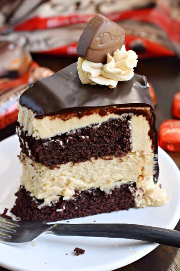 This stunning Chocolate Peanut Butter Cheesecake Cake has layers of homemade chocolate cake and peanut butter cheesecake. Topped with a creamy peanut butter frosting and dark chocolate ganache, this cake is sure to satisfy that sweet tooth!
