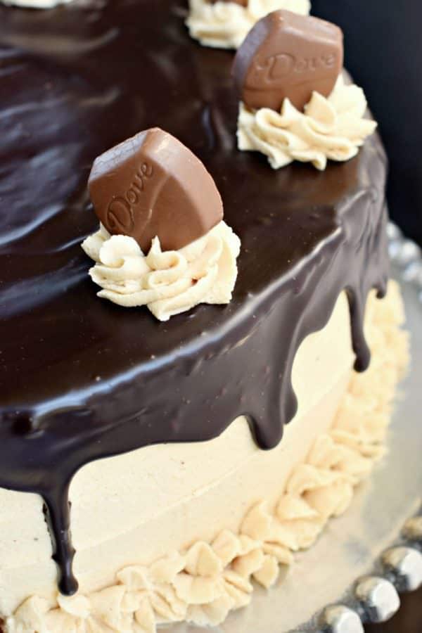 This stunning Chocolate Peanut Butter Cheesecake Cake has layers of homemade chocolate cake and peanut butter cheesecake. Topped with a creamy peanut butter frosting and dark chocolate ganache, this cake is sure to satisfy that sweet tooth!