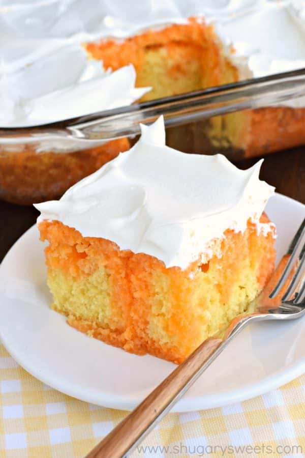 This Lemon Orange JELL-O cake is a refreshing treat at the end of the day. Made with a lemon cake and orange gelatin, you'll love the texture!