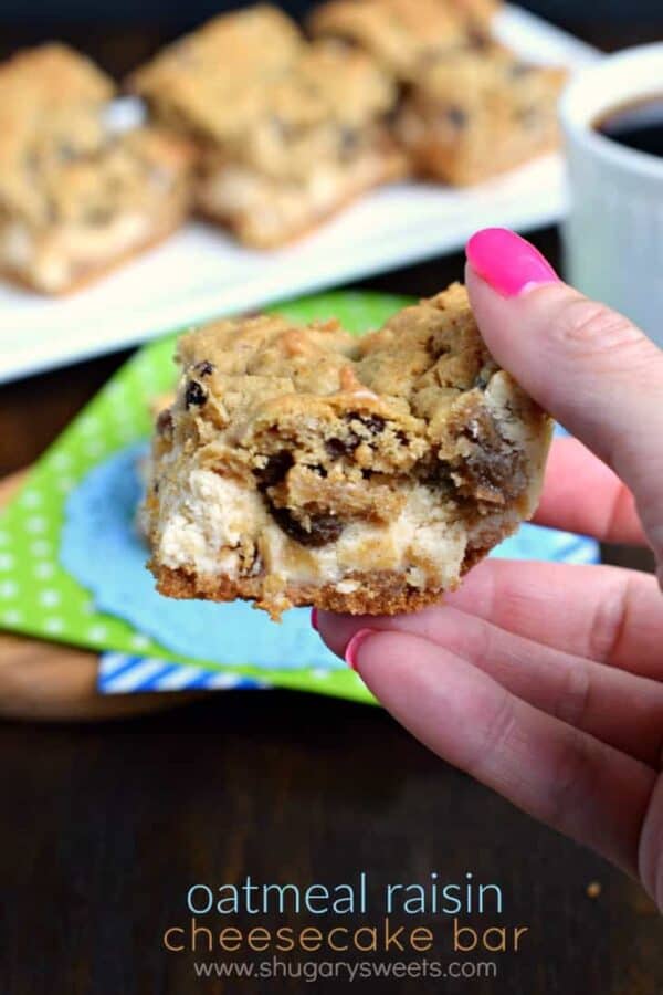 Soft and chewy oatmeal raisin cookie on top of a creamy cheesecake bar! These Oatmeal Raisin Cookie Cheesecake Bars are delicious, comfort food treats!