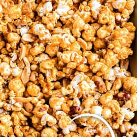 Learn how to make Homemade Cracker Jack popcorn that's even better than the original. Sweet and crunchy, this addictive caramel corn is just what your next movie night needs!