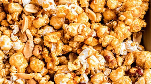 Learn how to make Homemade Cracker Jack popcorn that's even better than the original. Sweet and crunchy, this addictive caramel corn is just what your next movie night needs!