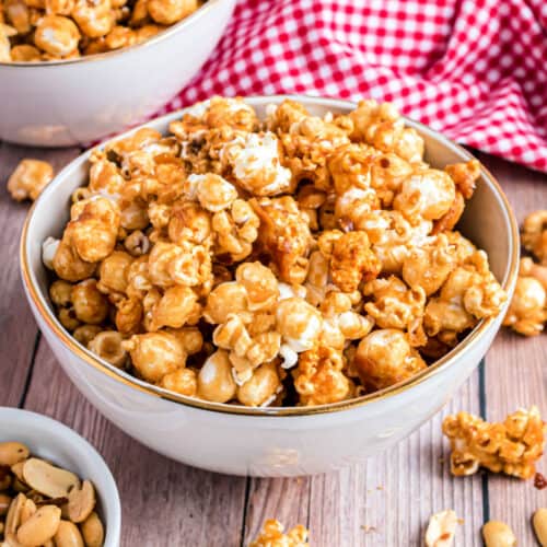 Homemade caramel corn in a white bowl.