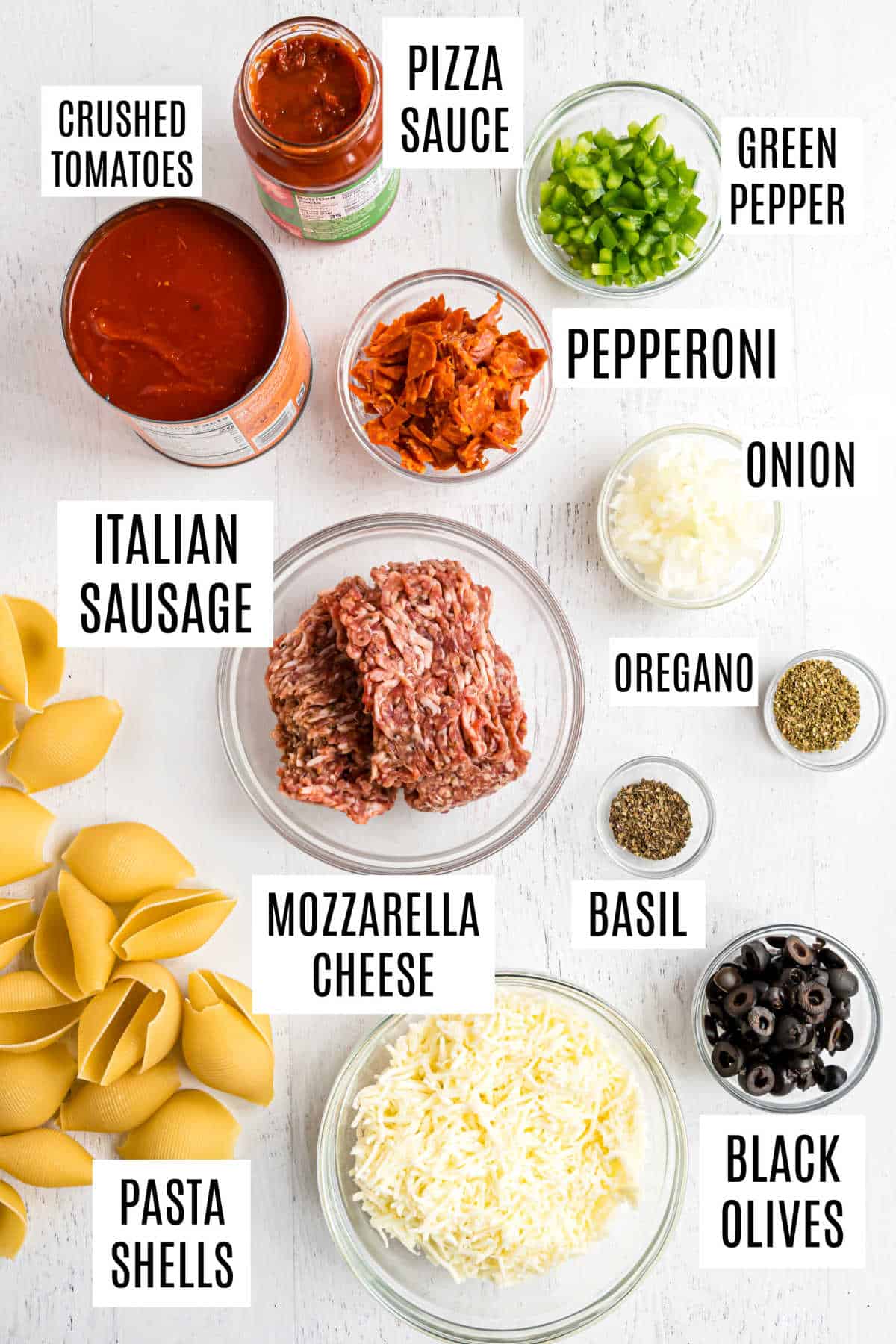 Ingredients needed to make pasta shells stuffed with pizza toppings.
