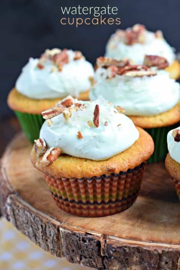 You're going to LOVE these Watergate Cupcakes! Extremely nutty and moist thanks to pistachio pudding and pecans. Topped with a sweet, light whipped frosting, which is perfect for summer!