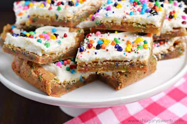 Chewy and butter-rich Cake Batter Blondies are so easy to make! Don't forget to top them with the sweet cake batter frosting too for an over the top dessert!