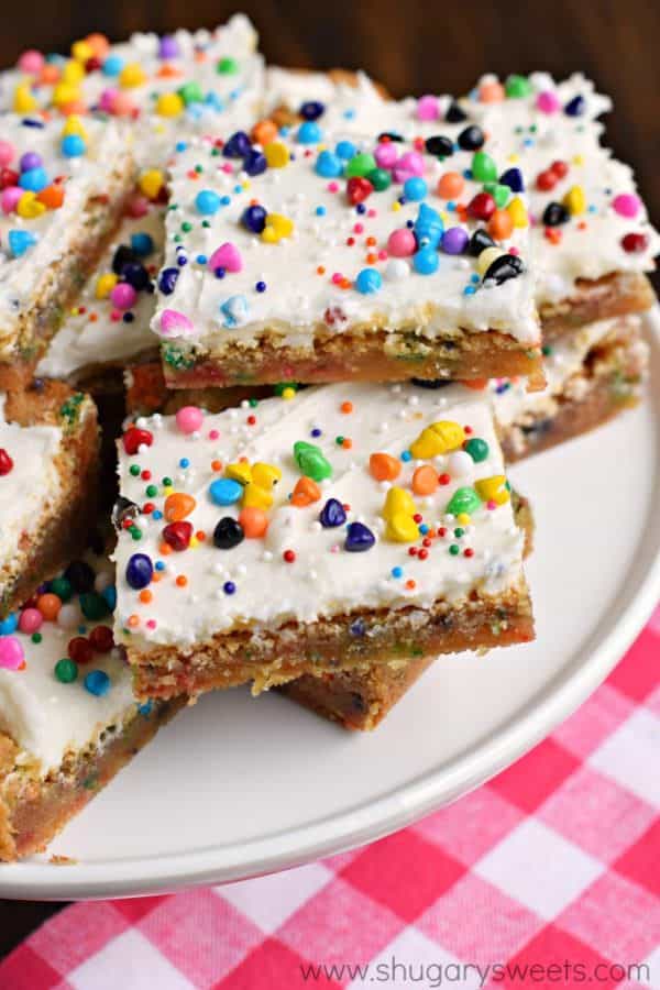 Chewy and butter-rich Cake Batter Blondies are so easy to make! Don't forget to top them with the sweet cake batter frosting too for an over the top dessert!