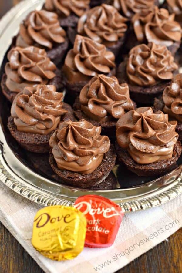 Decadent, fudgy Chocolate Caramel Brownie Bites with DOVE Chocolate. Chewy chocolate brownies with a creamy caramel candy filling! Topped with a rich chocolate caramel frosting, these brownie bites are the perfect birthday treat!
