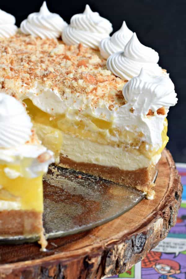 No oven needed with this beautiful, layered NO BAKE Banana Cream Cheesecake! You'll love the cookie crust with the creamy cheesecake, fresh bananas, banana pudding and whipped topping!