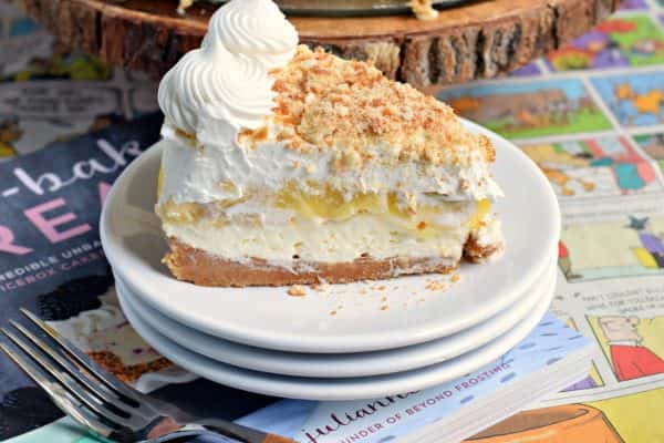 No oven needed with this beautiful, layered NO BAKE Banana Cream Cheesecake! You'll love the cookie crust with the creamy cheesecake, fresh bananas, banana pudding and whipped topping!