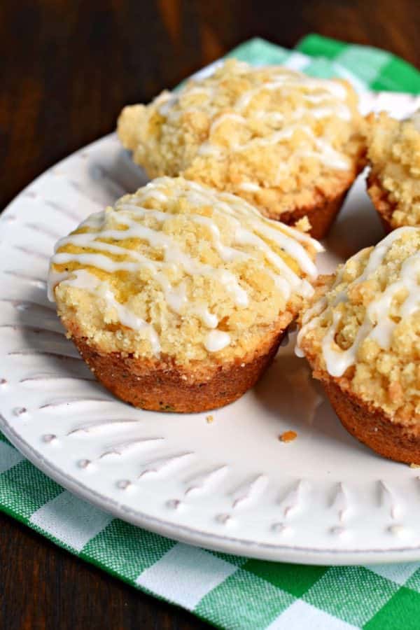 Use up some of the summer zucchini with these incredibly moist and delicious Lemon Poppy Seed Zucchini Muffins. The crumb topping and sweet lemon glaze add so much texture and flavor!