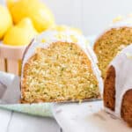 This Lemon Zucchini Cake is bright and full of sweet tangy flavor! Put that garden zucchini to use and make a perfect bundt cake for breakfast, tea time or dessert.
