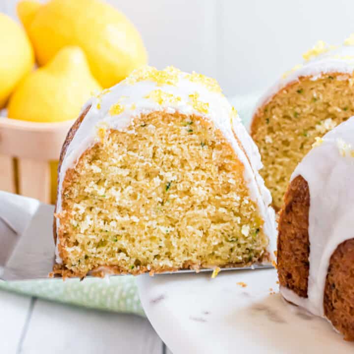 This Lemon Zucchini Cake is bright and full of sweet tangy flavor! Put that garden zucchini to use and make a perfect bundt cake for breakfast, tea time or dessert.