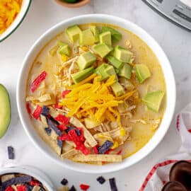 Get out your slow cooker, this Southwest Chicken Chowder is a fix and forget it dinner recipe! Packed with potatoes, corn, and chicken, you'll love the kick of flavor from the jalapenos, salsa, and taco seasoning!
