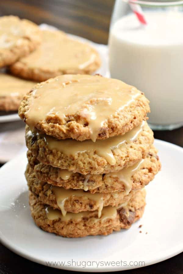 These homestyle Iced Caramel Toffee Oatmeal Cookies are better than anything bought in a store! Bake a batch today and watch them disappear!