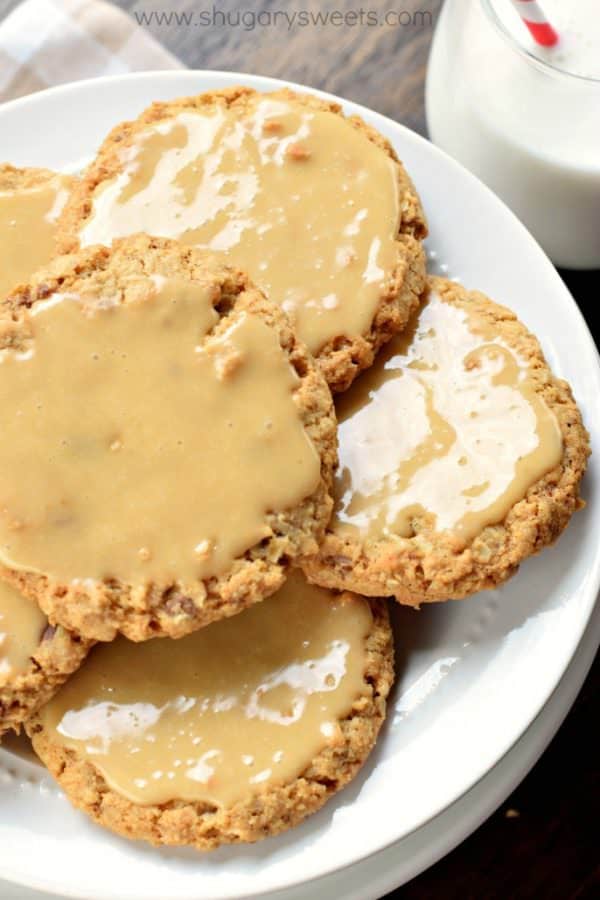 These homestyle Iced Caramel Toffee Oatmeal Cookies are better than anything bought in a store! Bake a batch today and watch them disappear!