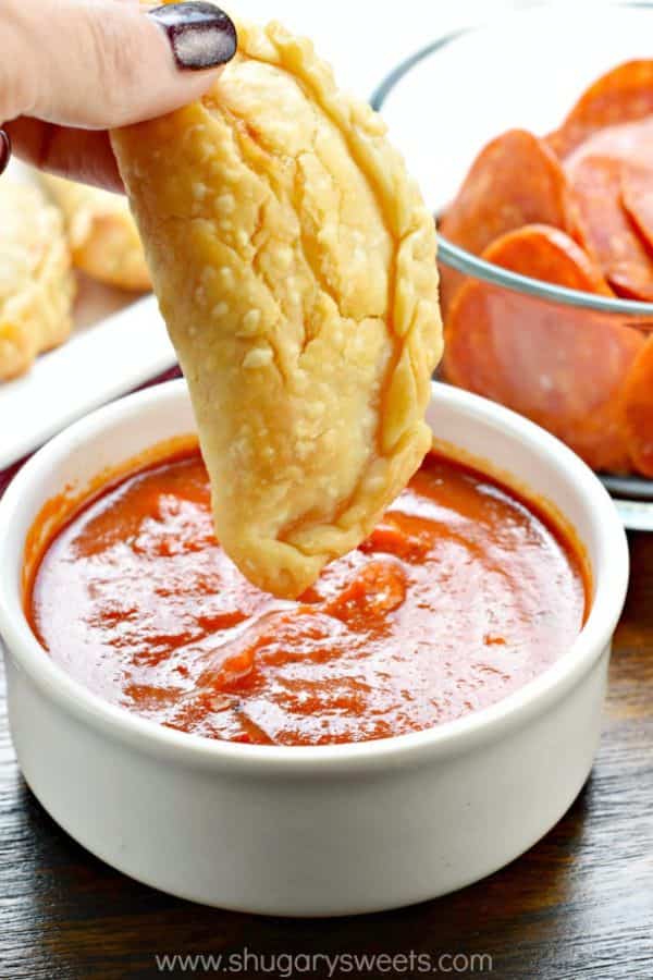 Flaky pie crust filled with pepperoni and cheese. These baked Pepperoni Pizza Hand Pies are ready in minutes and make a great meal!