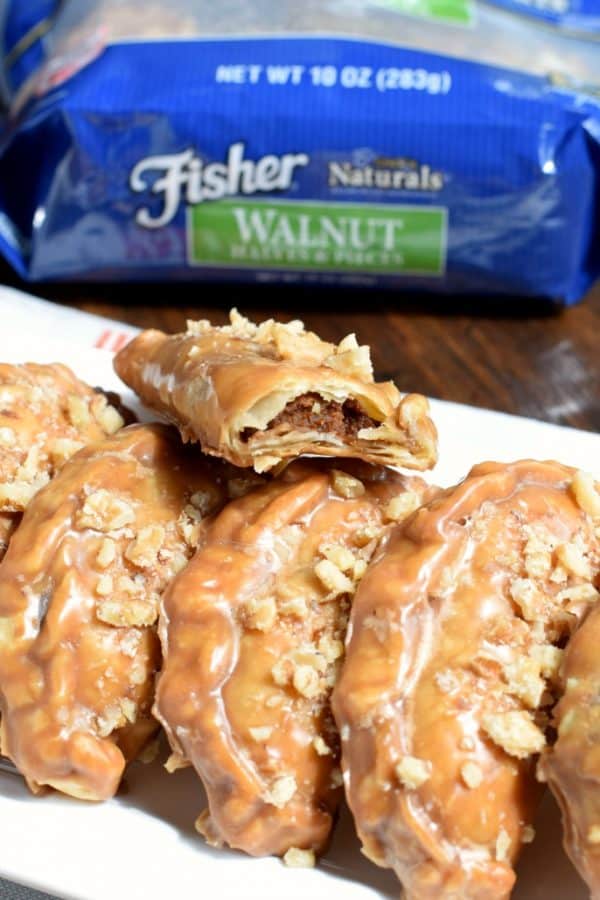These Pumpkin Hand Pies are the perfect fall treat! The flaky crust and nutty pumpkin pie filling are the perfect combo in a hand pie, plus they’ve got a wonderful maple walnut glaze!