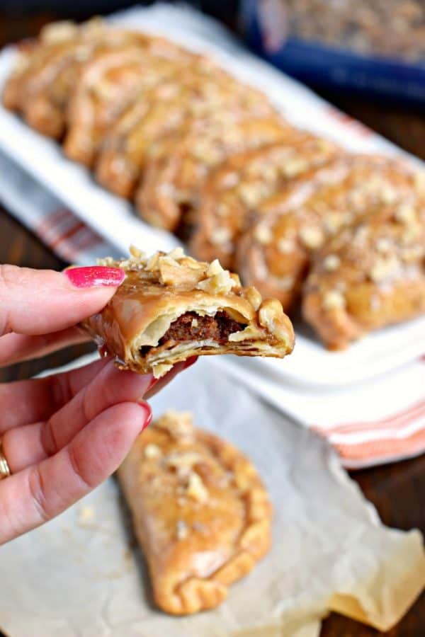 These Pumpkin Hand Pies are the perfect fall treat! The flaky crust and nutty pumpkin pie filling are the perfect combo in a hand pie, plus they’ve got a wonderful maple walnut glaze!