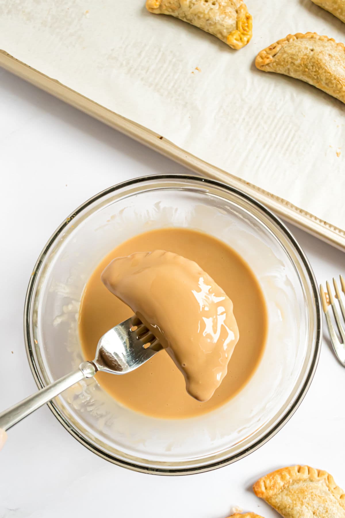 Pumpkin hand pie dipped in a maple glaze.